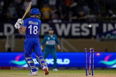 Ibrahim Zadran is bowled by Matt Henry